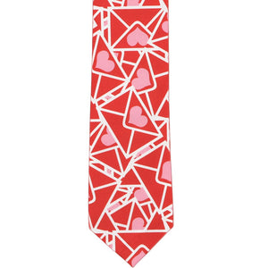 The front of a slim tie with a Valentine's Day envelope design in red and pink