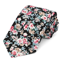 Load image into Gallery viewer, A black and tan floral tie, rolled to show tie tip