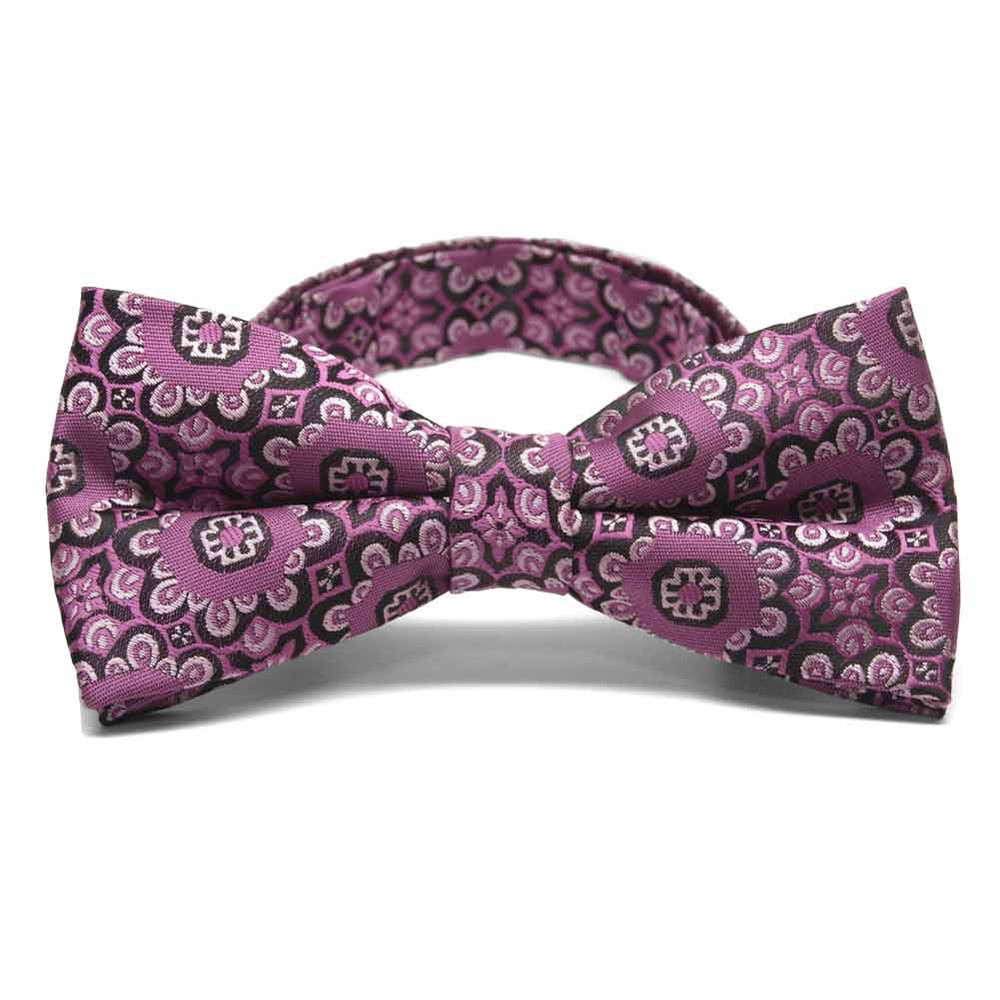 Front view of a deep magenta floral pattern bow tie