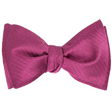 Load image into Gallery viewer, A tied magenta self tie bow tie in a herringbone pattern