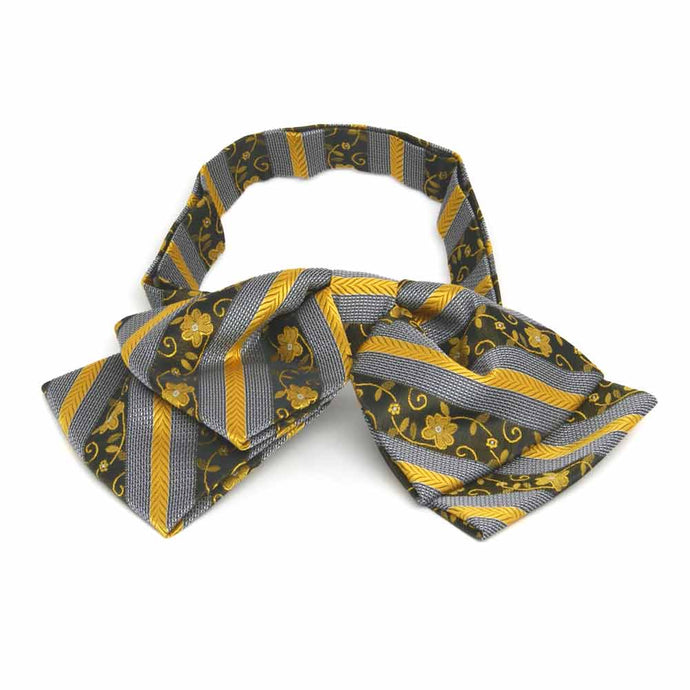 Black and yellow floral stripe floppy bow tie, front view