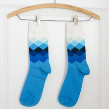 Load image into Gallery viewer, Pair of men&#39;s blue diamond pattern socks hanging