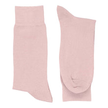 Load image into Gallery viewer, A men&#39;s pair of blush pink dress socks folded flat