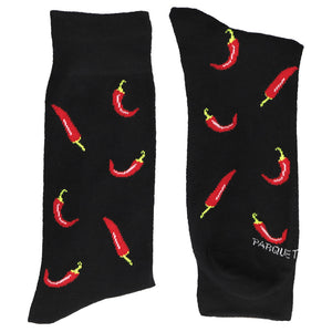 A folded pair of men's chili pepper themed socks in black