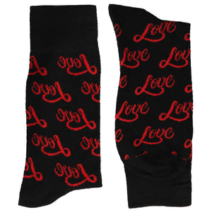 A folded pair of black and red love novelty socks