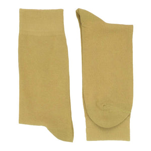 Pair of men's pale gold socks folded