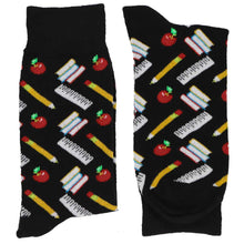Load image into Gallery viewer, Pair of folded men&#39;s black socks with scattered school supplies