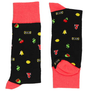 A folded pair of men's slot machine themed socks in red and black