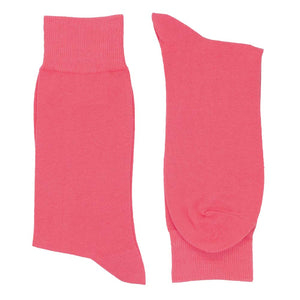 A pair of men's strawberry pink socks