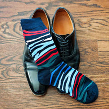 Load image into Gallery viewer, Pair of men&#39;s colorful zebra pattern socks with black dress shoes