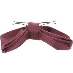Side view of a merlot clip-on bow tie, opened