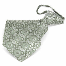 Load image into Gallery viewer, Folded front view of a mint green floral pattern zipper style tie