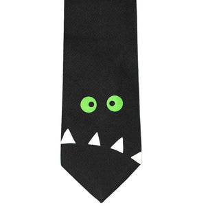 Front view of a goofy black monster necktie