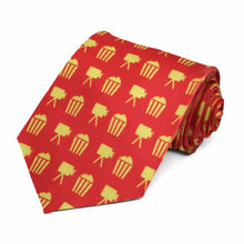 Load image into Gallery viewer, Yellow popcorn buckets on a red tie.