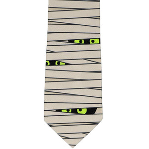 Front view of a mummy wrapped necktie with spooky glowing eyes