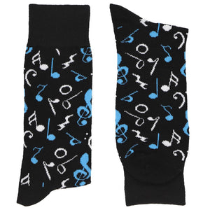 A folded pair of black socks with turquoise and white music notes