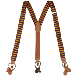 A pair of striped suspenders in orange and navy blue with small pin dots