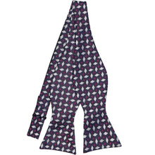 Load image into Gallery viewer, A navy blue untied self-tie bow tie with a silver and violet geometric pattern