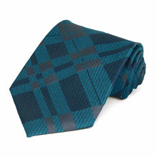 Load image into Gallery viewer, Dark teal and navy blue plaid necktie rolled to show geometric textured background