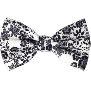 A navy blue and white floral men's pre-tied bow tie