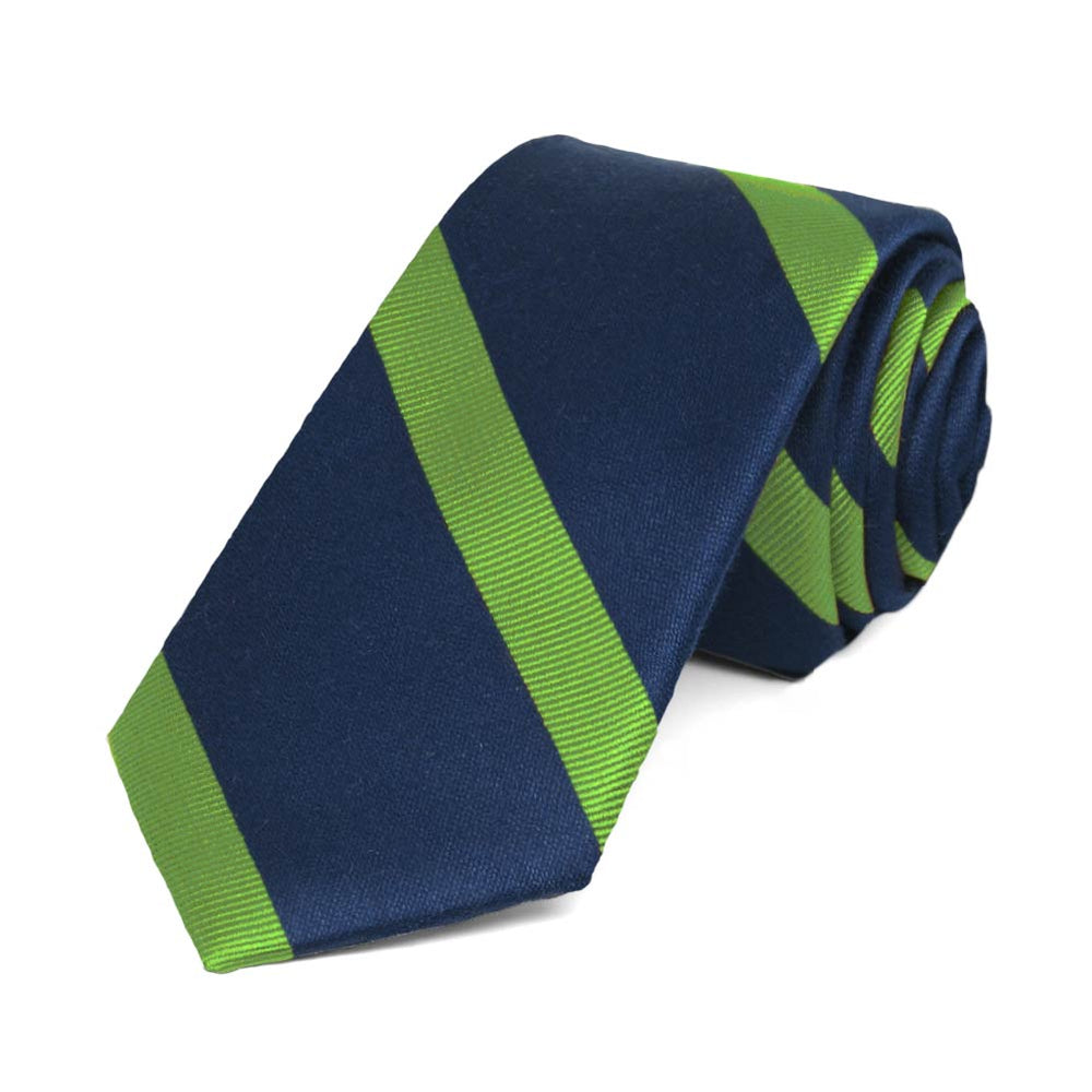 Navy blue and grass green striped skinny necktie, rolled to show the texture of the stripes