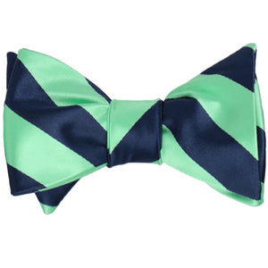 Navy blue and bright mint striped self-tie bow tie, tied