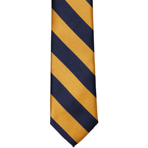 The front of a navy blue and gold bar striped tie, laid out flat