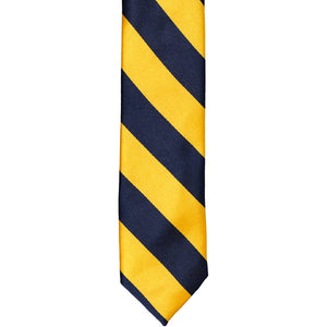 The front of a navy blue and golden yellow striped tie, laid out flat