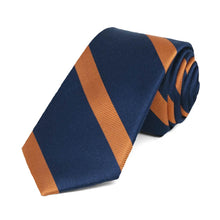 Load image into Gallery viewer, Navy blue and orange striped skinny tie, rolled to show the texture of the stripes