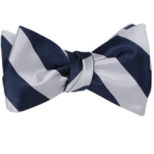 Load image into Gallery viewer, Navy blue and silver striped self-tie bow tie, tied