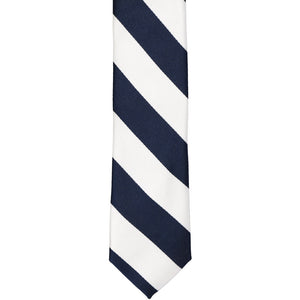 The front of a navy blue and white striped tie, laid out flat