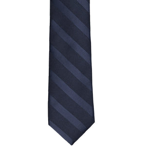 The front of a navy blue striped slim tie, laid out flat