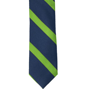 The front view of a navy blue slim tie with bright green ribbed stripes