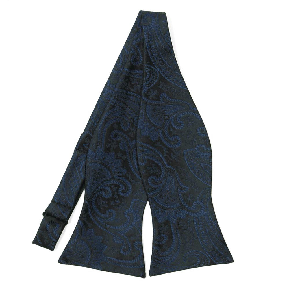 Navy blue paisley self-tie bow tie, untied flat front view