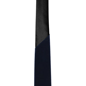 The point on a navy velvet tie that the material and collar switches to black satin material for easier tying