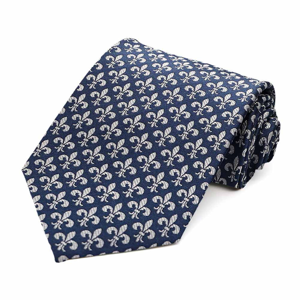 Navy blue and gray fleur de lis necktie, rolled to show woven texture