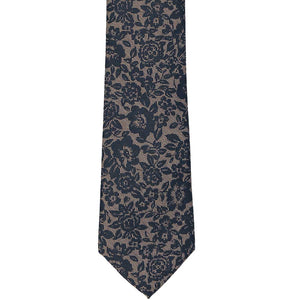 The front of a navy and tan floral tie with a lace like look