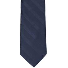 Load image into Gallery viewer, The front of a navy blue tone on tone striped tie, lying flat