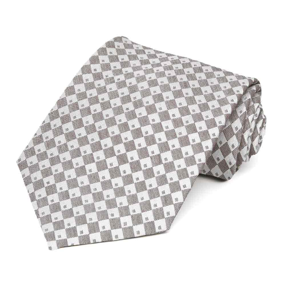 Light brown and white checked necktie, rolled to show texture