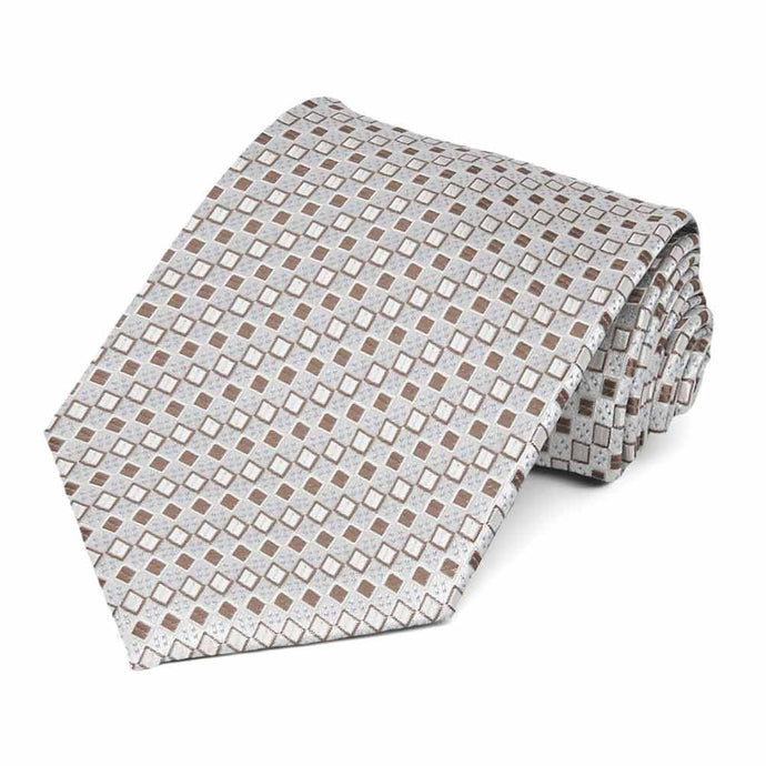 Off-white and tan square pattern necktie, rolled to show pattern up close