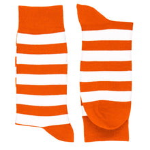 Load image into Gallery viewer, A pair of men&#39;s orange and white striped socks, folded in half