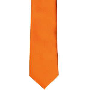 Front bottom of an orange tie in a slim width