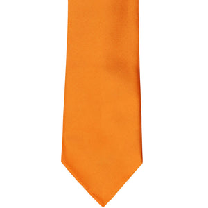 A solid orange tie, front flat view