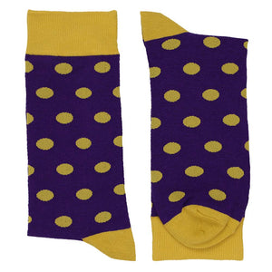 Pair of dark purple and gold polka dot socks