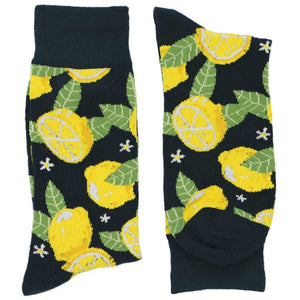 A folded pair of lemon novelty socks in shades of yellow and green