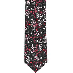The front, flat view of a black slim tie with a red and pink paisley pattern