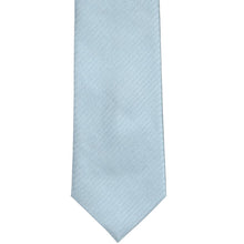 Load image into Gallery viewer, The front of a pale blue herringbone tie, laid out flat