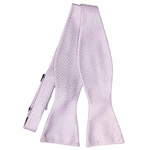 Light purple circle pattern self-tie bow tie, untied flat front view