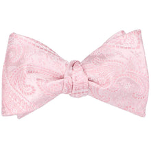 Load image into Gallery viewer, Pale pink paisley self-tie bow tie, tied