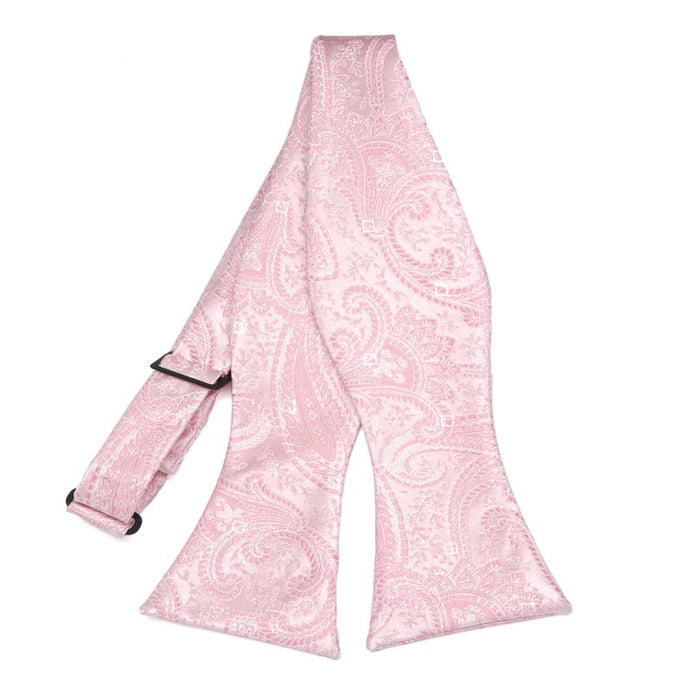 Light pink paisley self-tie bow tie, untied flat front view
